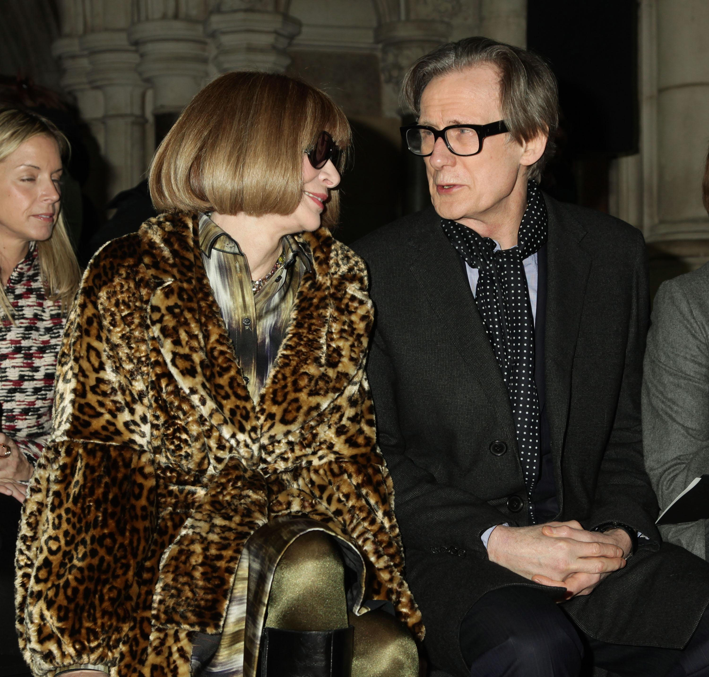 Anna Wintour and Bill Nighy sit together at London Fashion Week.
