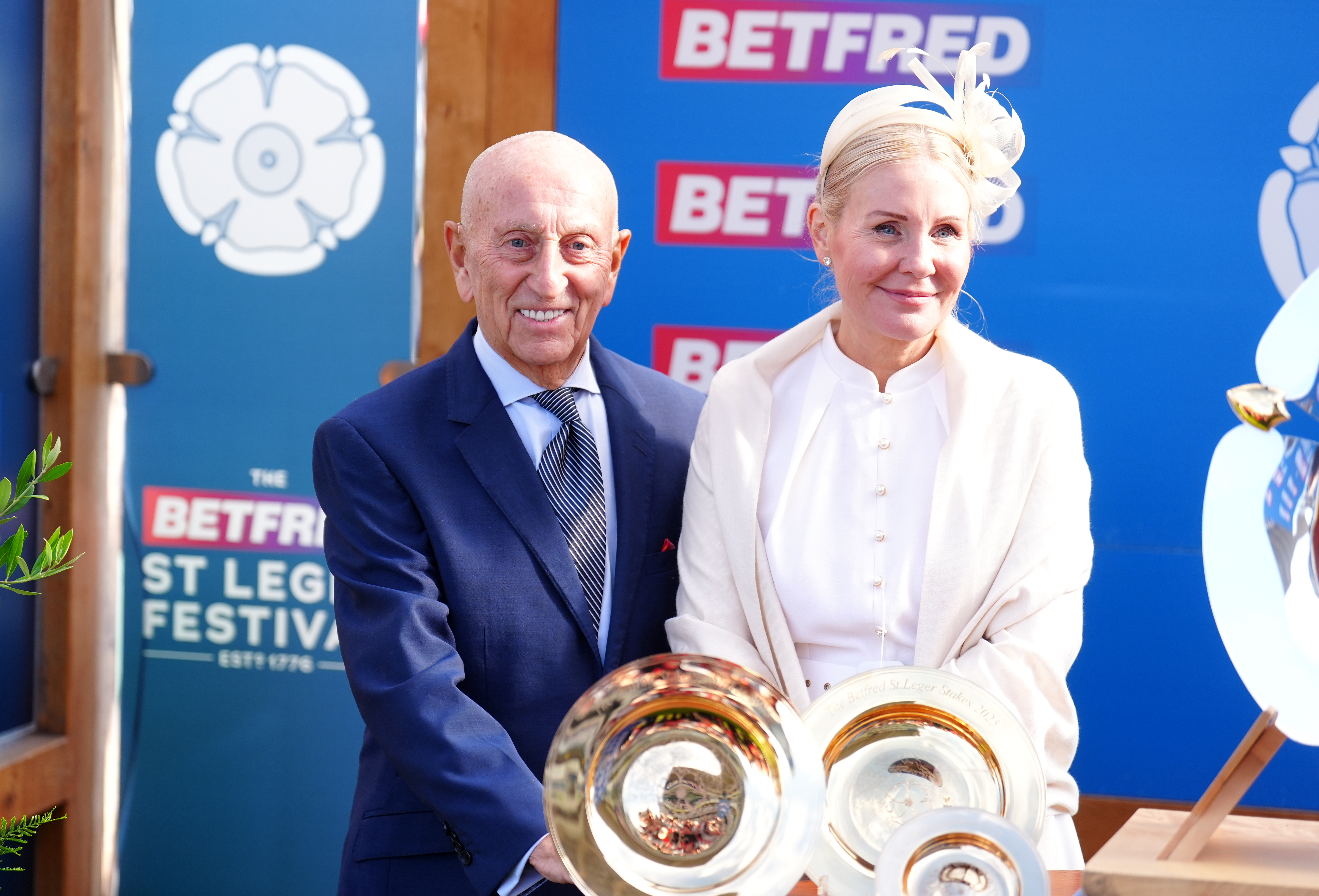 Fred Done and Nicola during a trophy presentation at the Betfred St Leger Festival 2025.