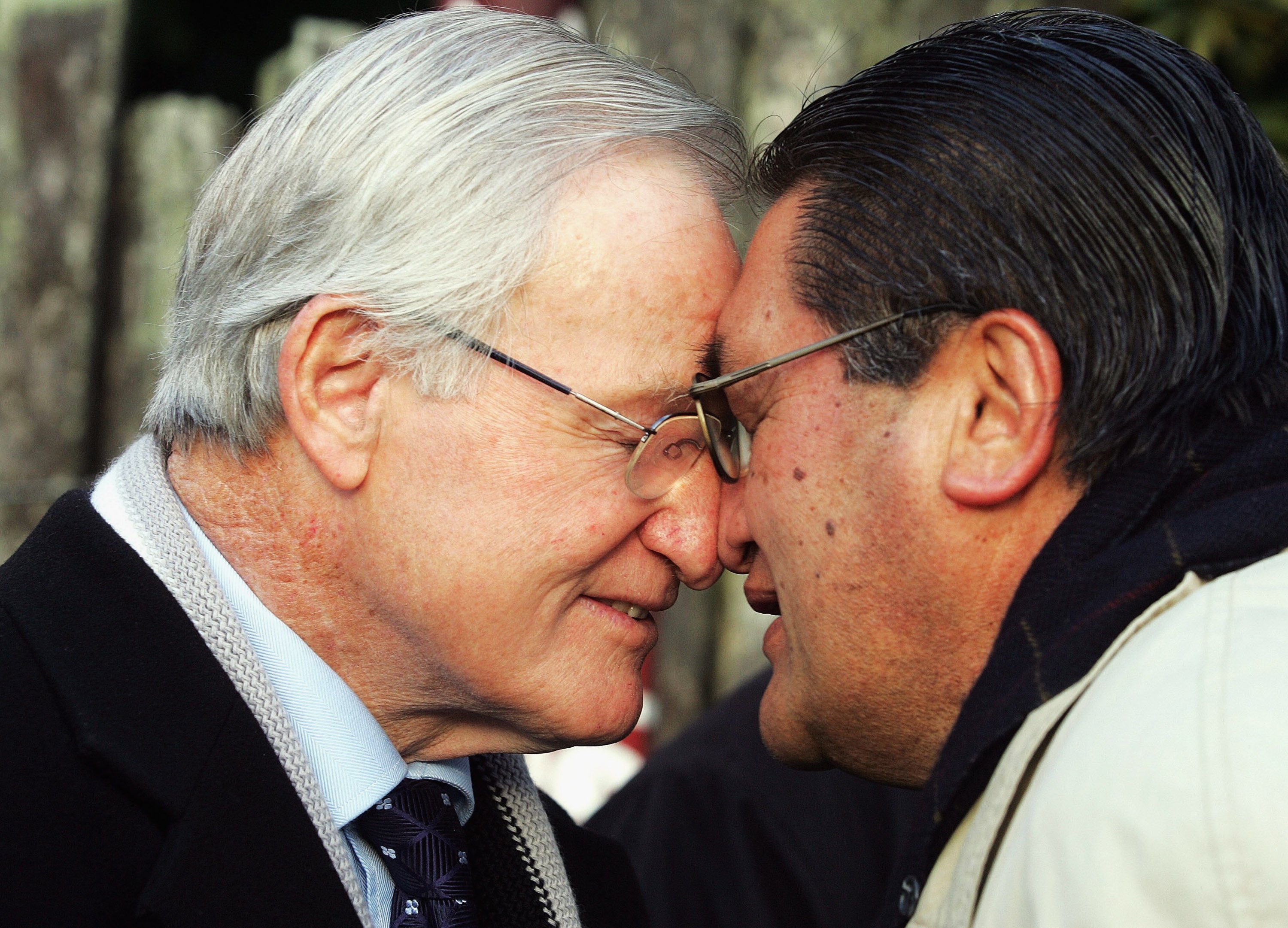 Former Prime Minister Jim Bolger hongis with Tommy Moana.
