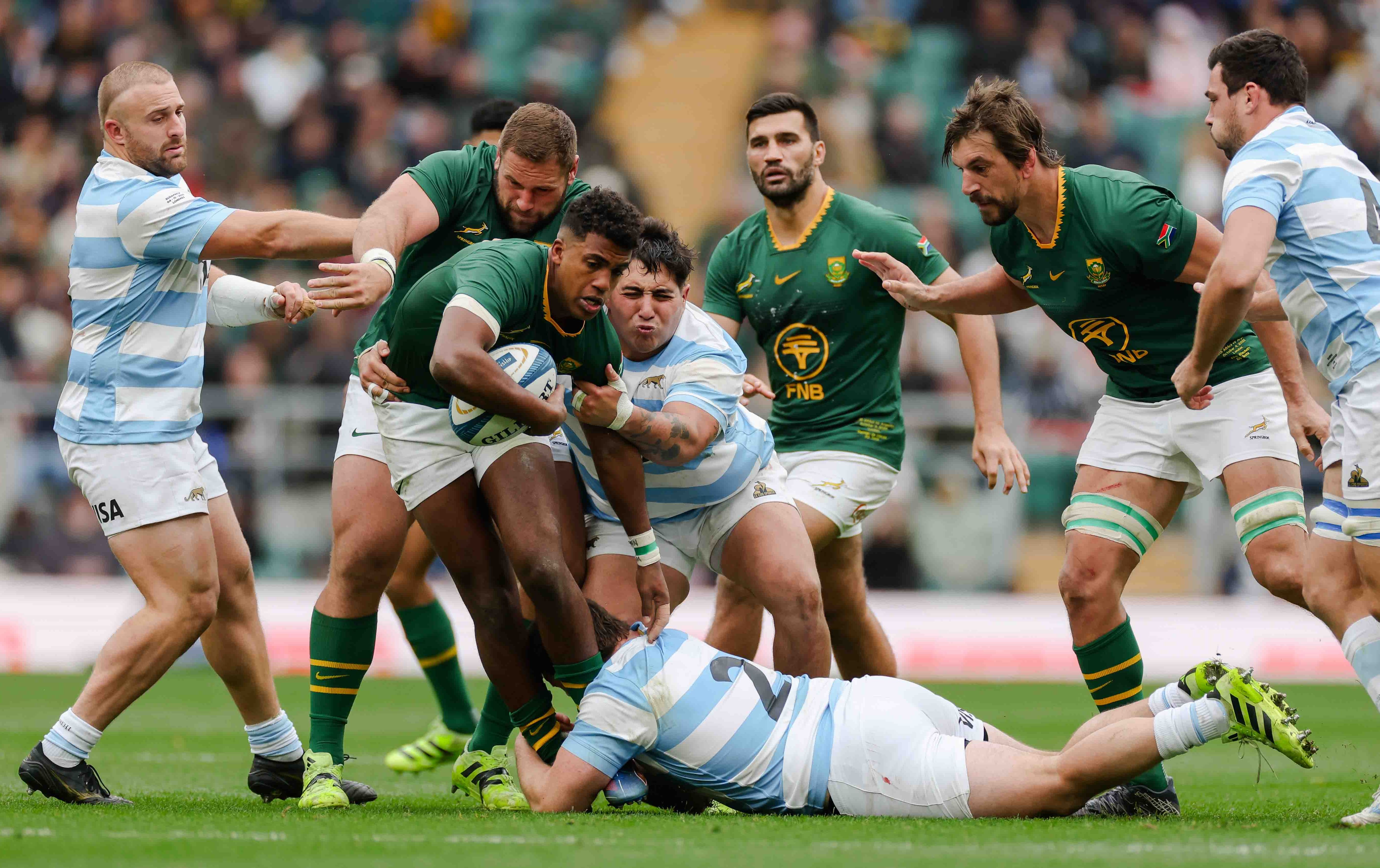 Canan Moodie of South Africa being tackled by Julián Montoya of Argentina during The Rugby Championship match.