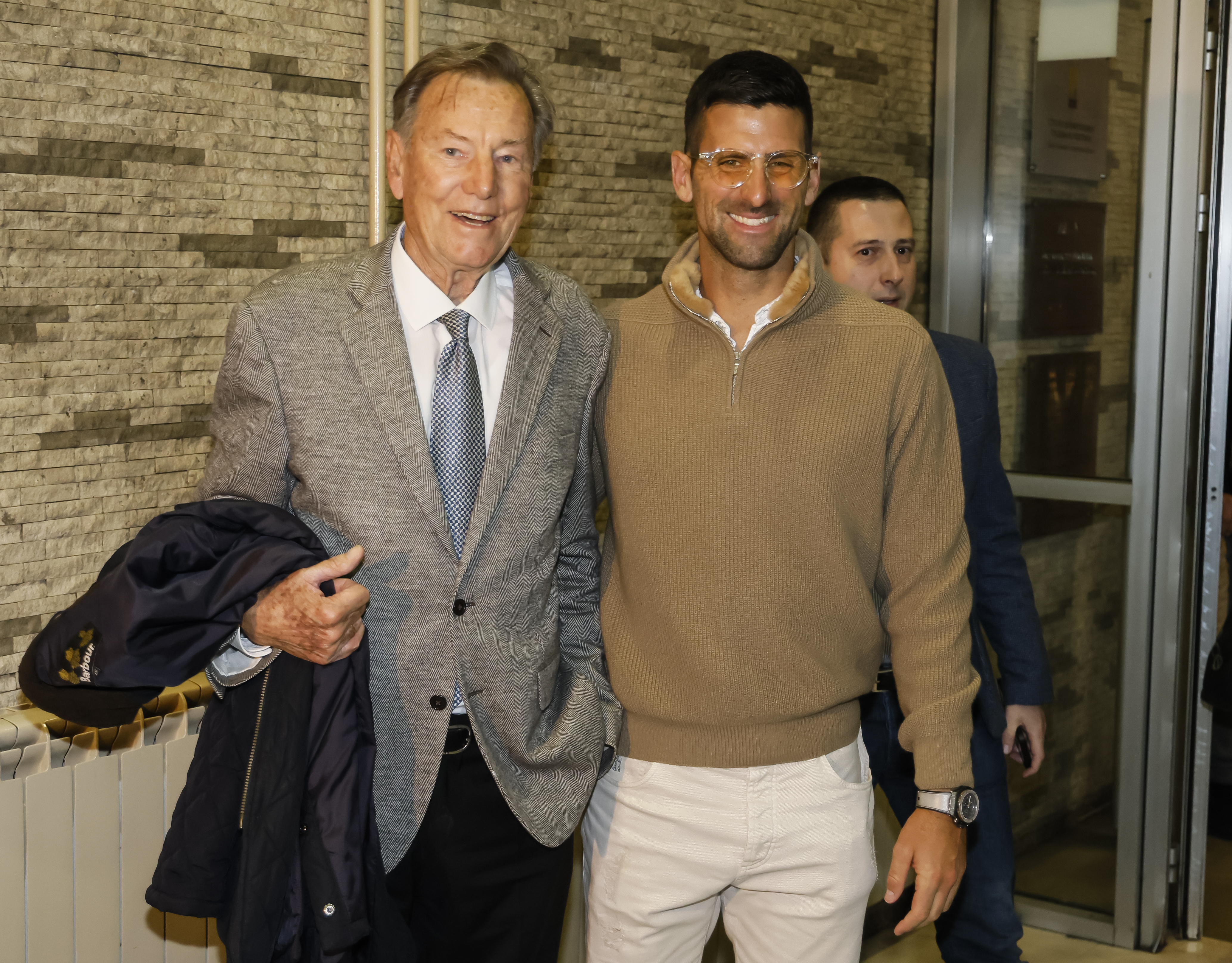 Nikola Pilic and Novak Djokovic attend a documentary film screening.