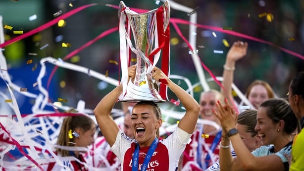 Katie McCabe of Arsenal celebrates with the UEFA Women's Champions League trophy after the UEFA Women's Champions League final match between Arsenal and Barcelona at Estádio José Alvalade in Lisbon, Portugal. 