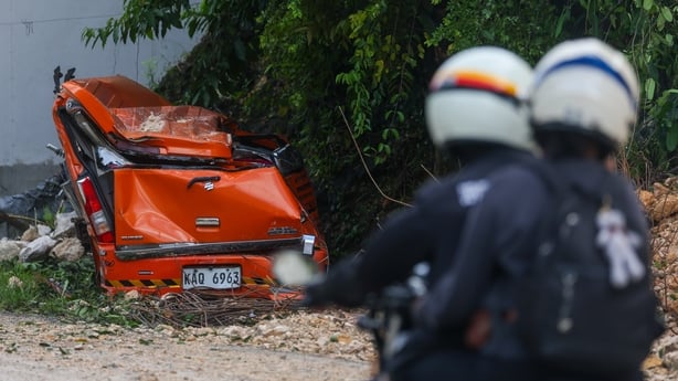 A landslide caused by earthquakes crushed a vehicle following a magnitude 6.9 earthquake that jolted parts of the island, in Cebu, Philippines on October 01, 2025. 