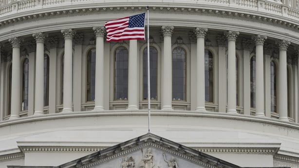 A US flag is seen flying on Capitol hill