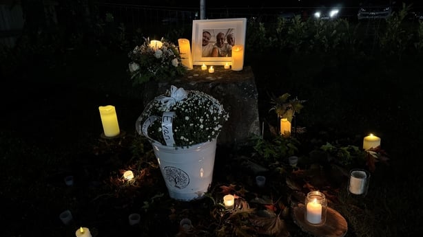 A candlelit vigil for Mark, Louise and Evan O'Connor