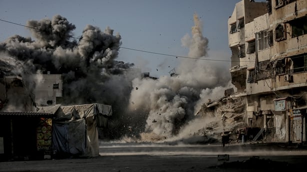 Explosion is seen following Israeli attack on Omar al-Mukhtar Street of Gaza City