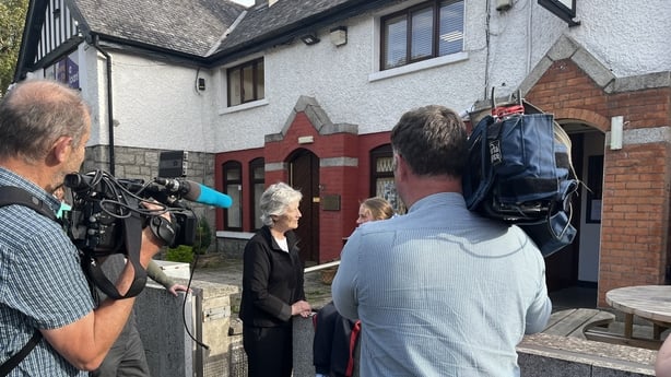 Catherine Connolly campaigning in Tallaght with tv camera crews filming her