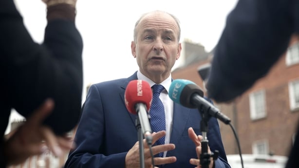 Micheal Martin speaks to reporters