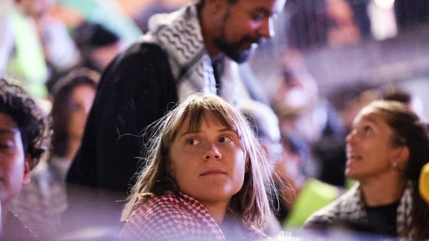 Swedish activist Greta Thunberg (C) and other participants of the Global Sumud Flotilla attend a press conference in Stockholm, Sweden 