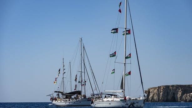 Two sail boats anchored in the sea