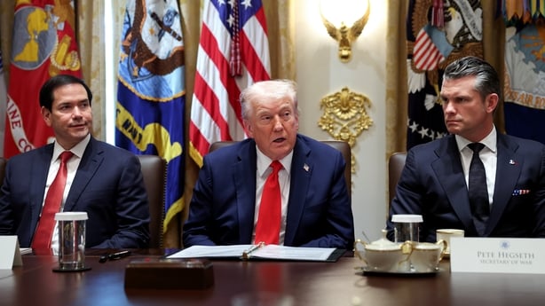 US President Donald Trump, joined by Secretary of State Marco Rubio (L) and Defense Secretary Pete Hegseth, speaks during a Cabinet meeting at the White House.
