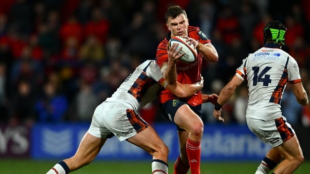 10 October 2025; Tom Farrell of Munster is tackled by Piers O'Conor of Edinburgh during the United Rugby Championship match between Munster and Edinburgh at Virgin Media Park in Cork. Photo by Shauna Clinton/Sportsfile