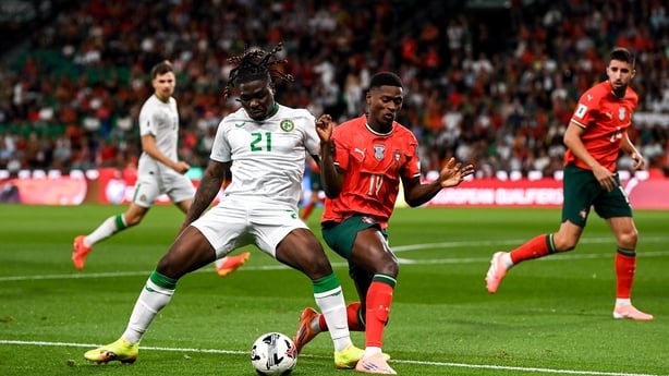 Festy Ebosele of Republic of Ireland in action against Nuno Mendes of Portugal during the FIFA World Cup 2026 Group F qualifying match between Portugal and Republic of Ireland at Estádio José Alvalade in Lisbon, Portugal.