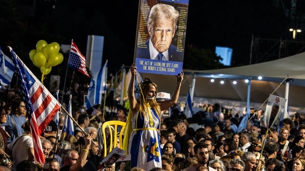 People take part in a gathering at Hostages Square in Tel Aviv