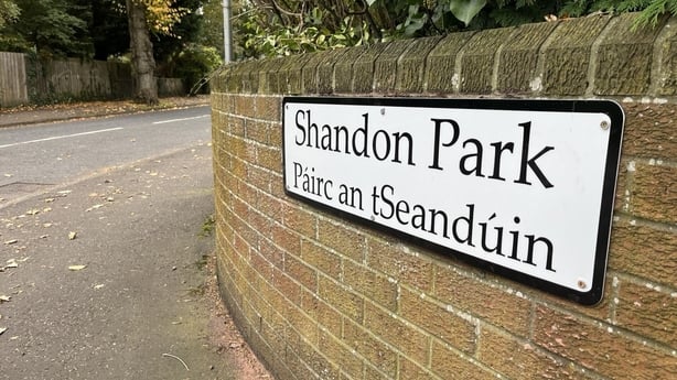 A sign on a brick on in Belfast reads in Irish Shandon Park in English and Páirc an tSeandúin in Irish