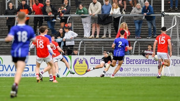 12 October 2025; Gavin Cooney of Éire Óg shoots to score his side's first goal during the Clare County Senior Club Football Championship final match between Éire Óg Ennis and St Joseph's Doora-Barefield at Zimmer Biomet Páirc Chíosóg in Ennis, Clare. Photo by John Sheridan/Sportsfile