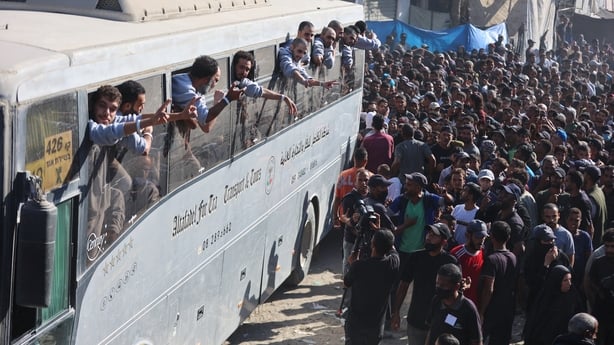 People gather to welcome Palestinians released from Israeli prisons under a Gaza ceasefire and hostage exchange deal