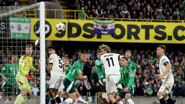 Germany's striker #11 Nick Woltemade (C) scores the team's first goal during the 2026 World Cup Group A qualifying football match between Northern Ireland and Germany at Windsor Park stadium, in Belfast, on October 13, 2025. (Photo by Paul Faith / AFP)