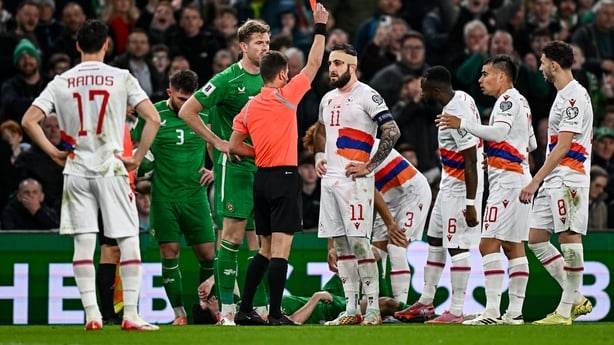 14 October 2025; Tigran Barseghyan of Armenia is shown a red card by referee Benoît Bastien during the FIFA World Cup 2026 Group F qualifying match between Republic of Ireland and Armenia at the Aviva Stadium in Dublin. Photo by Seb Daly/Sportsfile