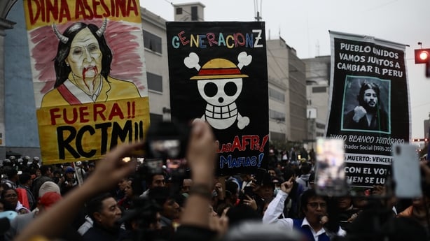 LIMA, PERU - SEPTEMBER 27: A group of people from the so called "Generation Z" clashed with members of the Peruvian police guarding the Congress of the Republic during a demonstration on September 27, 2025, in Lima, Peru. Lima, the nation's capital, faces a mobilization by urban transport associatio