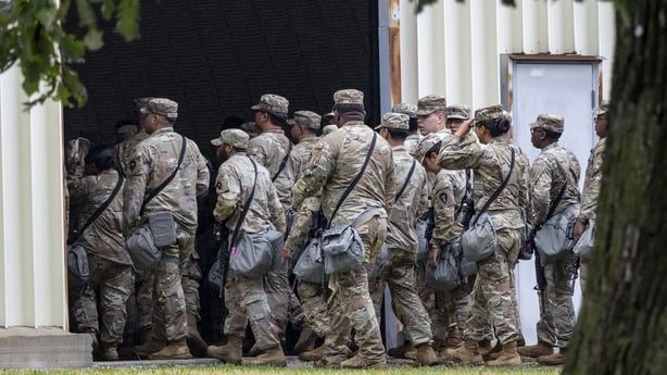 Members of the Texas National Guard arrive at the Army Reserve Training Center in Elwood, Illinois. (Brian Cassella/Chicago Tribune/Tribune News Service via Getty Images)