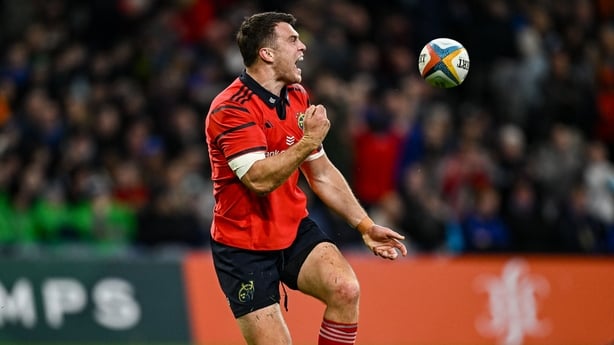 18 October 2025; Tom Farrell of Munster celebrates after scoring his side's second try during the United Rugby Championship match between Leinster and Munster at Croke Park in Dublin. Photo by Seb Daly/Sportsfile