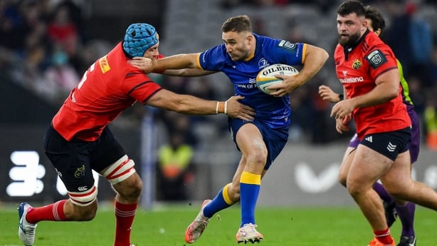 18 October 2025; Jordan Larmour of Leinster in action against Tadhg Beirne of Munster during the United Rugby Championship match between Leinster and Munster at Croke Park in Dublin. Photo by Brendan Moran/Sportsfile