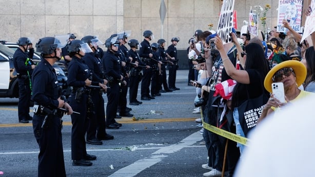 LOS ANGELES, CALIFORNIA - OCTOBER 18: Protesters begin to face off with police outside the Metropolitan Detention Center as part of the 