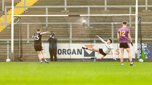19 October 2025; Paul Devlin of Kilcoo scores his side's first goal, a penalty, during the Down County Senior Club Football Championship final match between Carryduff and Kilcoo at Páirc Esler in Newry, Down. Photo by Thomas Flinkow/Sportsfile