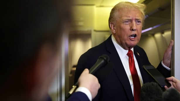 IN FLIGHT - OCTOBER 19: U.S. President Donald Trump speaks to members of the press on October 19, 2025 aboard Air Force One. The President is returning to Washington, DC, after spending his weekend at Mar-a-Lago resort in Palm Beach, Florida. (Photo by Alex Wong/Getty Images)