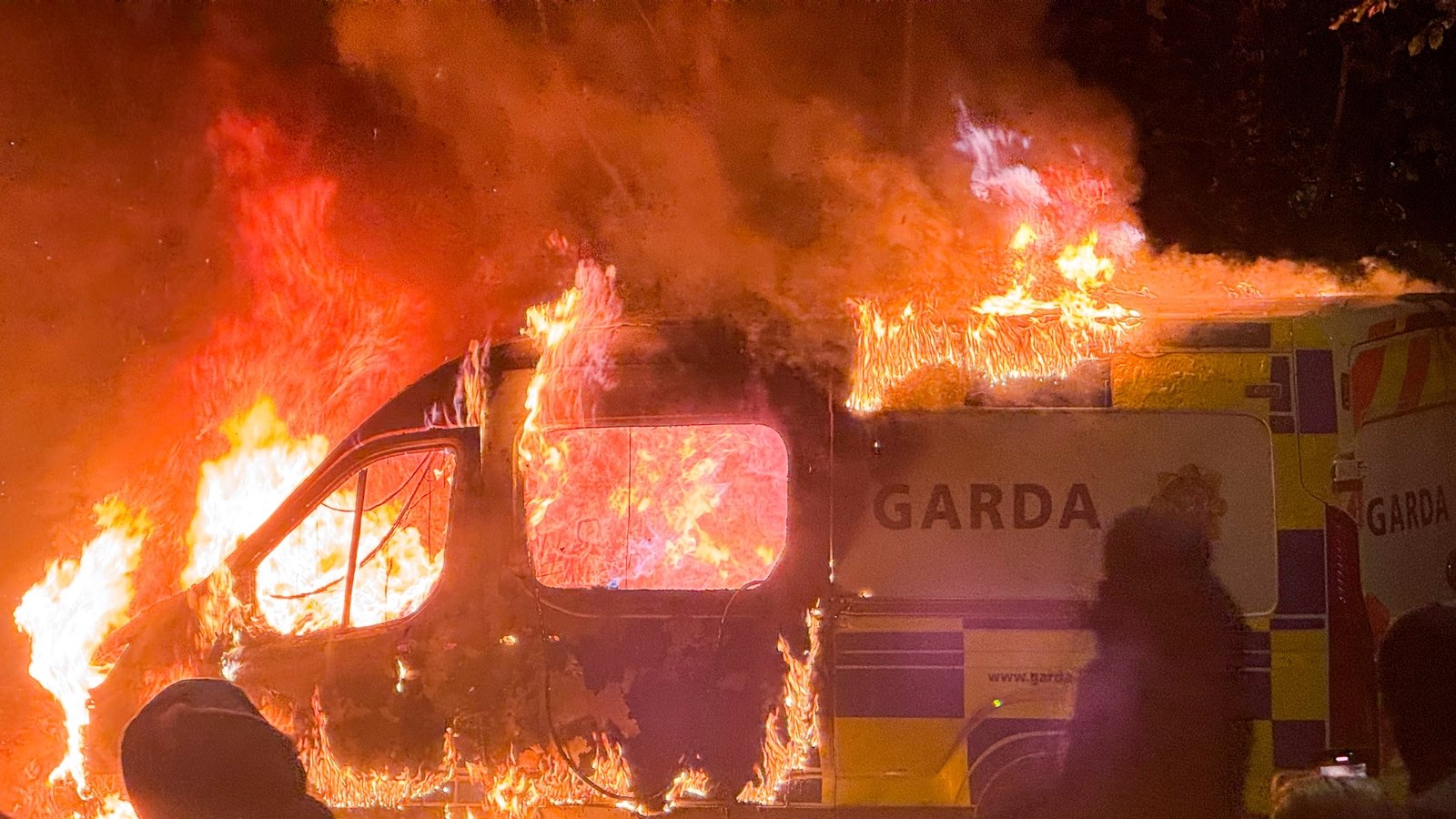 Garda van set alight at Citywest protest in Dublin