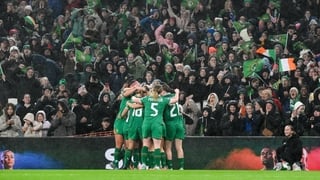 24 October 2025; Republic of Ireland players celebrate with supporters after Katie McCabe, hidden, scored their side's second goal during the UEFA Women's Nations League A/B promotion/relegation play-off first leg match between Republic of Ireland and Bel