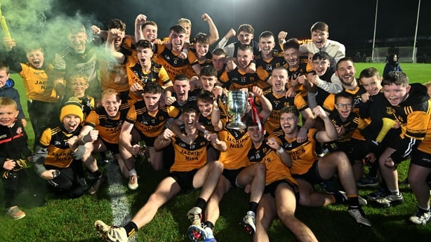 Loughmacrory players celebrate with the O'Neill cup