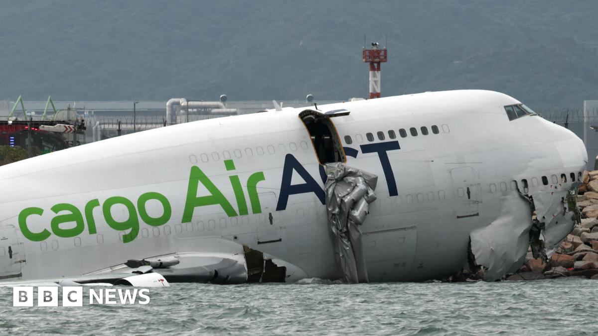 Hong Kong: Two dead after cargo plane skids off runway into sea - follow live