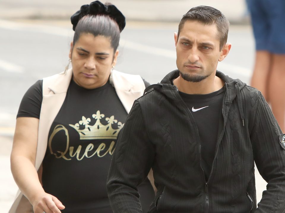 Marek Puska and his partner Jozefina Grundzova outside court
