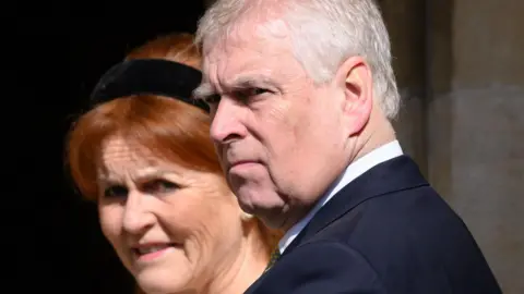 Getty Images Sarah Ferguson wearing a black hairband, and Prince Andrew in a dark suit pictured on April 20, 2025 in Windsor, England
