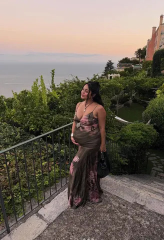 Vanessa Hudgens / Instagram Hudgens posed in a sundress in Italy earlier this year
