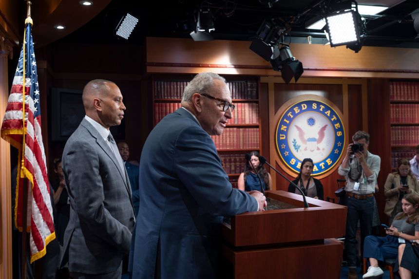 Senate Minority Leader Chuck Schumer and House Minority Leader Hakeem Jeffries talk with reporters following their meeting with President Donald Trump and Republican leaders on Monday.
