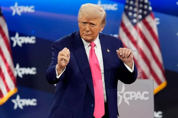US President Donald Trump dances during the Conservative Political Action Conference (CPAC) in National Harbor, Maryland, US, on Saturday, Feb. 22, 2025. The Conservative Political Action Conference launched in 1974 brings together conservative organizations, elected leaders, and activists. Photographer: Kent Nishimura/Bloomberg via Getty Images