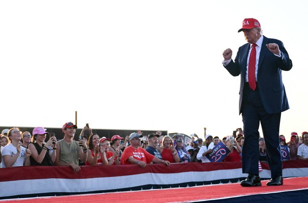 US President Donald Trump dances as he leaves the stage after speaking at the Salute to America Celebration at the Iowa State Fairgrounds in Des Moines on July 3, 2025. (Photo by ANDREW CABALLERO-REYNOLDS / AFP) (Photo by ANDREW CABALLERO-REYNOLDS/AFP via Getty Images)          