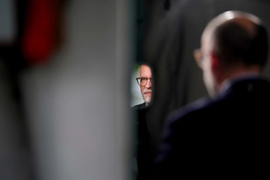 Director of the Office of Management and Budget Russ Vought gives an interview outside the White House on June 11, 2025.