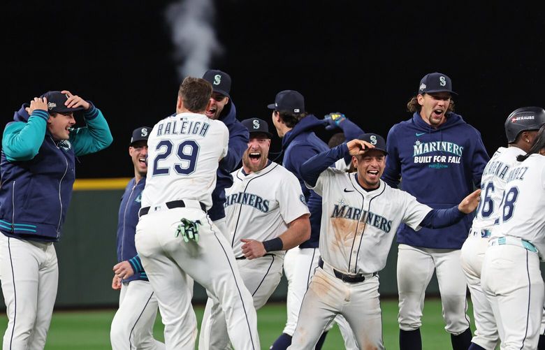 The Seattle Mariners celebrate their win against the Detroit Tigers in Game 5 of the ALDS Friday, Oct. 10, 2025 at T-Mobile Park, in Seattle, WA.