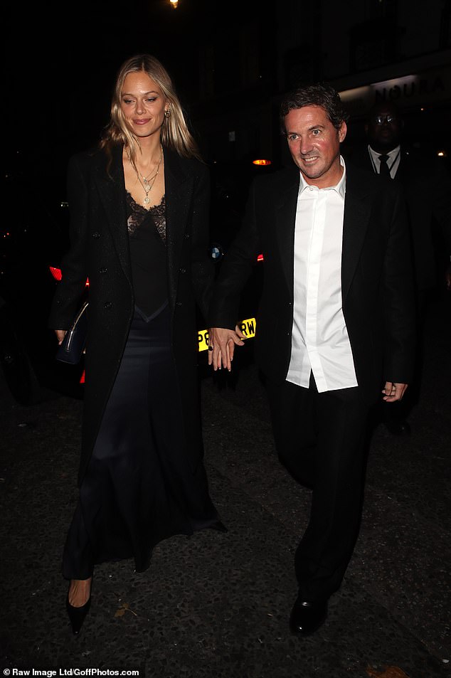 The couple looked more than loved-up as they held hands