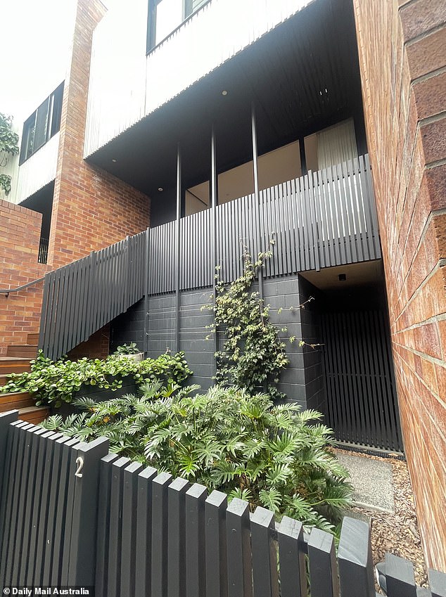 Neighbours say Dr Wilkes never moved into the two-storey townhouse she purchased in Norman Park (pictured) more than two years ago