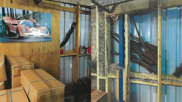 The false wall concealing 10 firearms that police allegedly found at the stash house linked to Kazem Hamad.