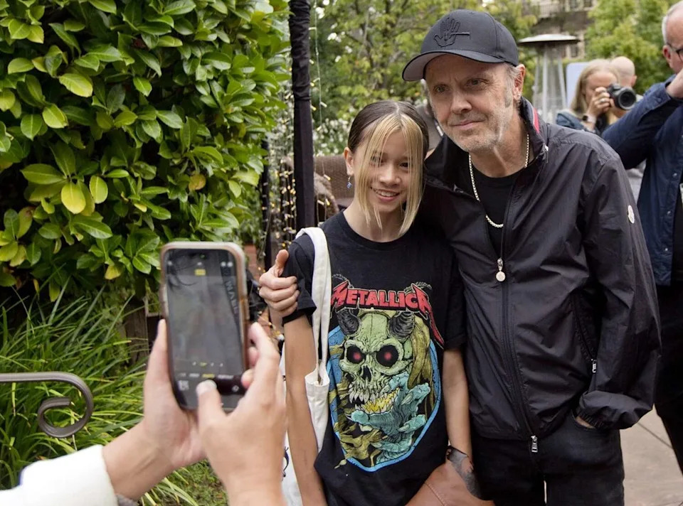 Metallica drummer and co-founder Lars Ulrich poses with a young Metallica fan at the Outdoor Art Club in Mill Valley ahead of a screening of "Metallica Saved My Life" at the Mill Valley Film Festival on Thursday, Oct. 9, 2025. (Tommy Lau/Mill Valley Film Festival)