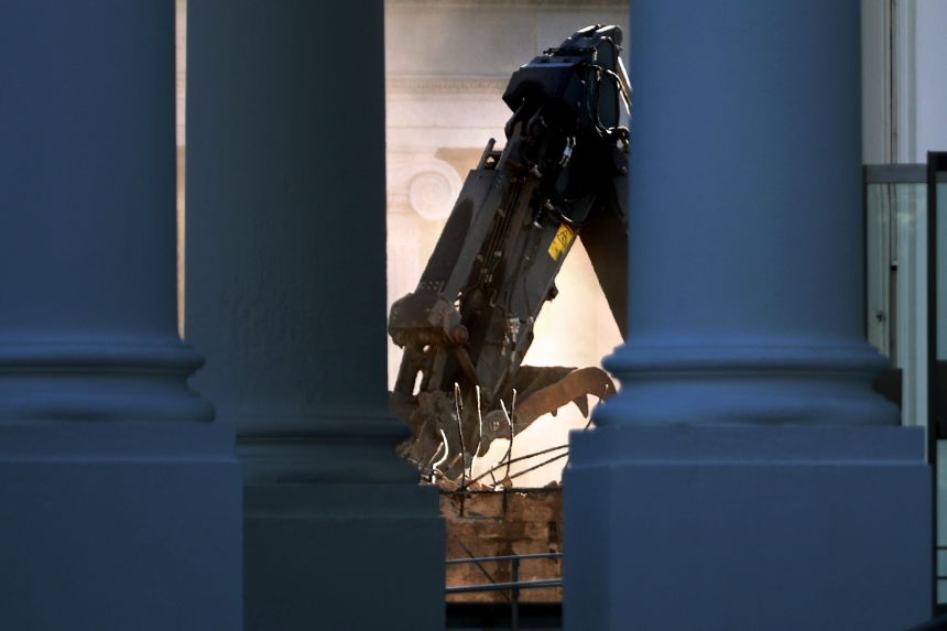 The facade of the East Wing of the White House is demolished by work crews on October 23, 2025.