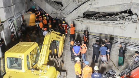 Rescuers race to find survivors after school collapse in Indonesia – video