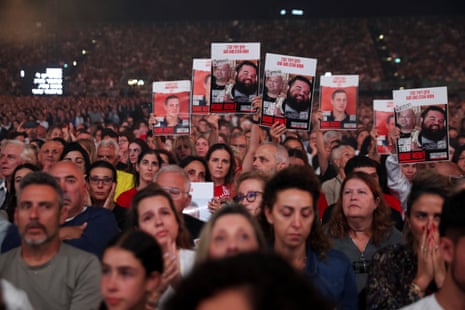 People attend a ceremony to mark the two-year anniversary of Hamas’s deadly 7 October 2023 attack on Israel, in Tel Aviv on Tuesday.