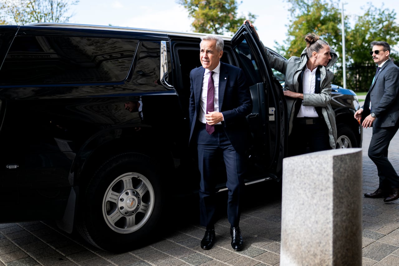 Prime Minister Mark Carney arrives on Parliament Hill in Ottawa, on Wednesday, Oct. 8, 2025.